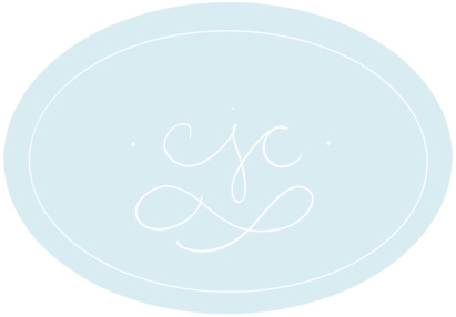 Powder blue oval with the letters 'CJC' written insid